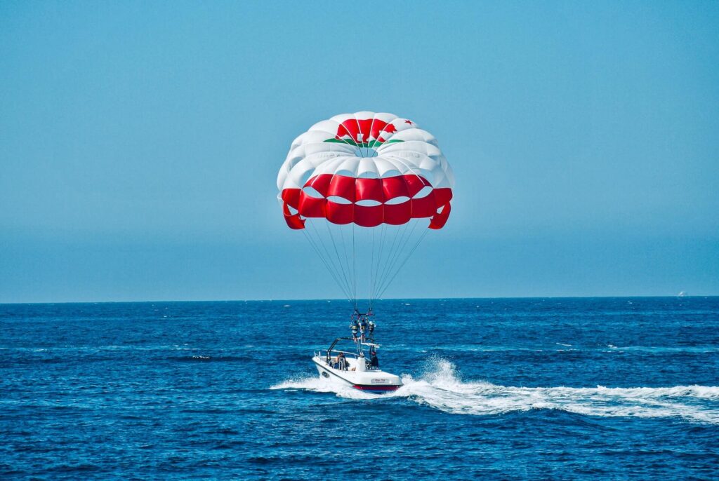 Parasail riders taking off