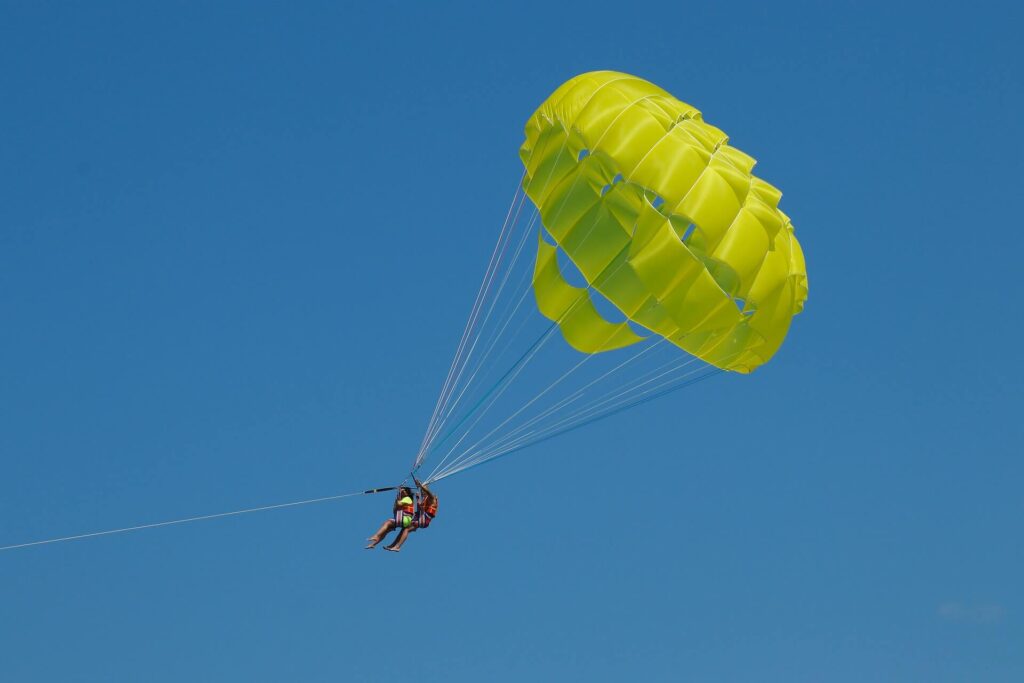 Two parasailing riders