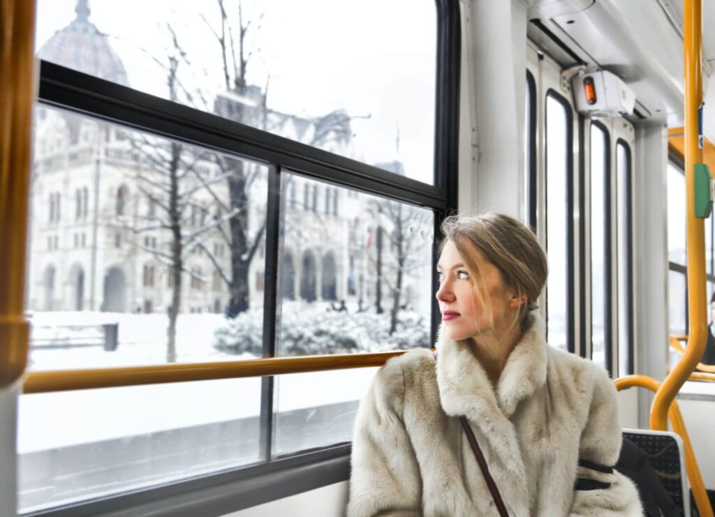 Lady looking outside the train window