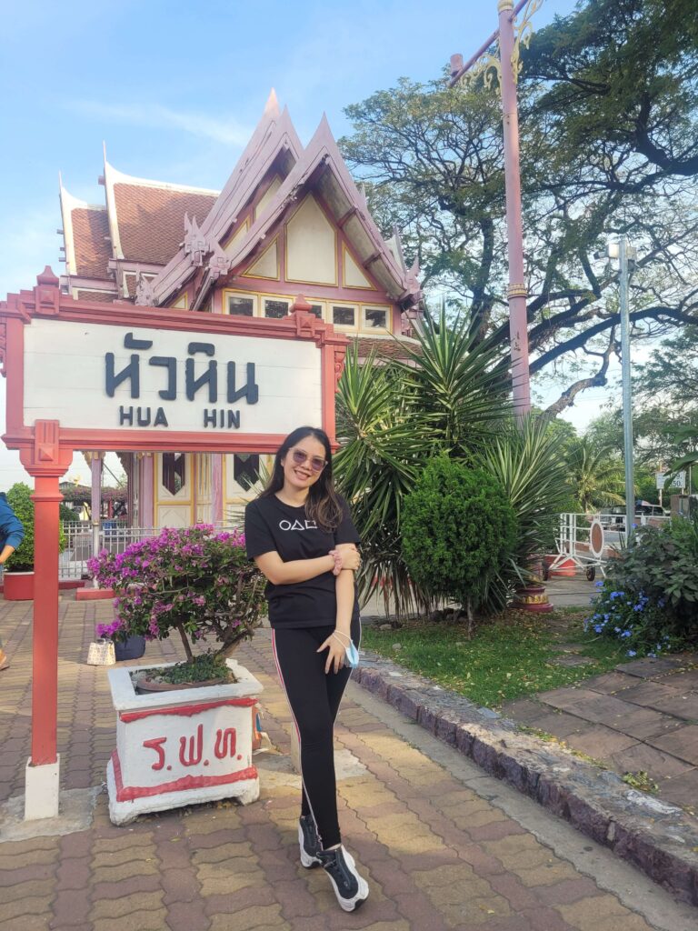 Marez posing in a Hua Hin signage